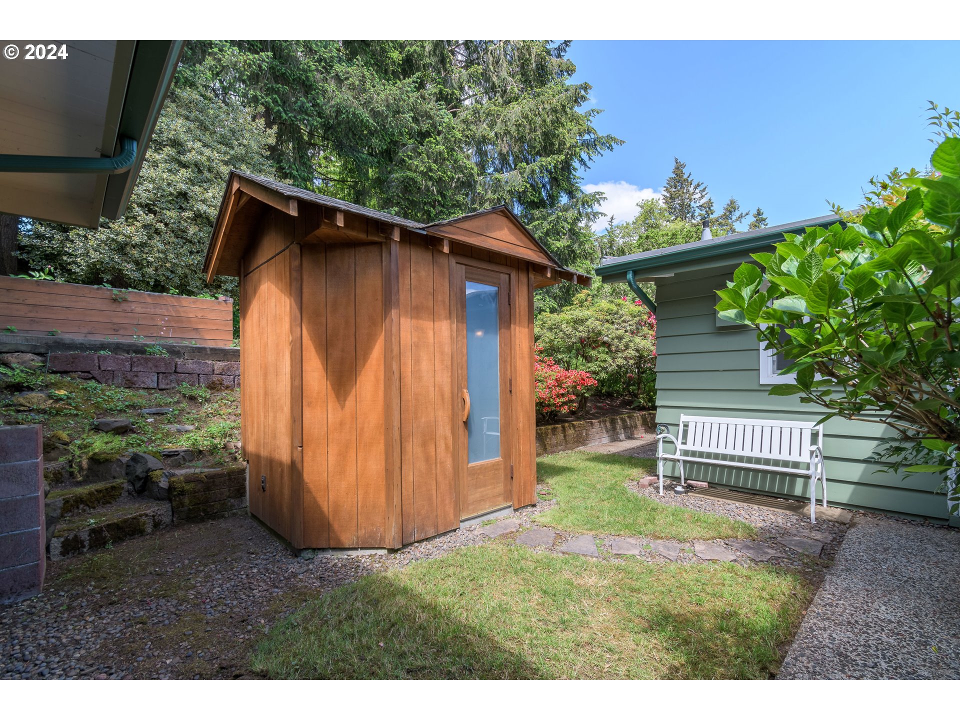 3430 View Lane Eugene, OR 97405 - Photo 32 of 48 a backyard of a house with lots of green space