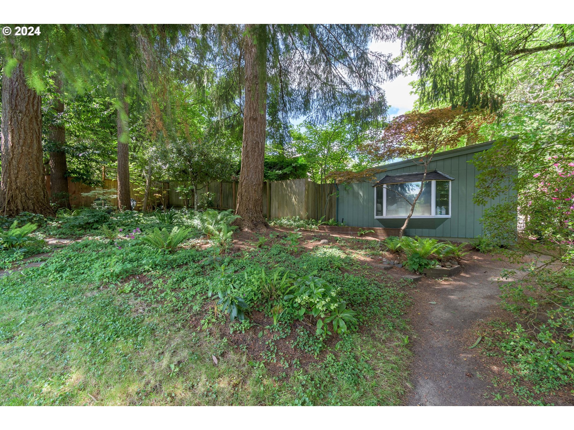 3430 View Lane Eugene, OR 97405 - Photo 37 of 48 a view of a house with a yard