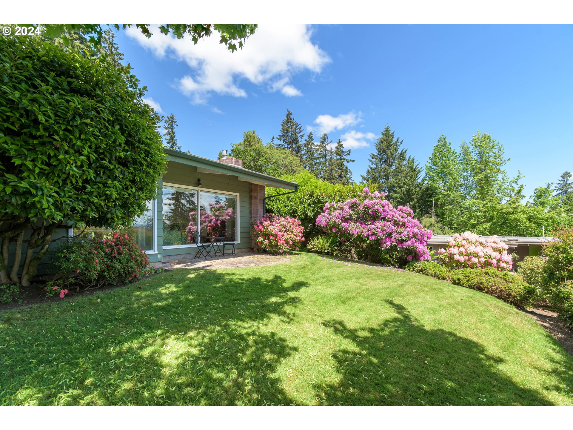 3430 View Lane Eugene, OR 97405 - Photo 40 of 48 a front view of a house with a yard