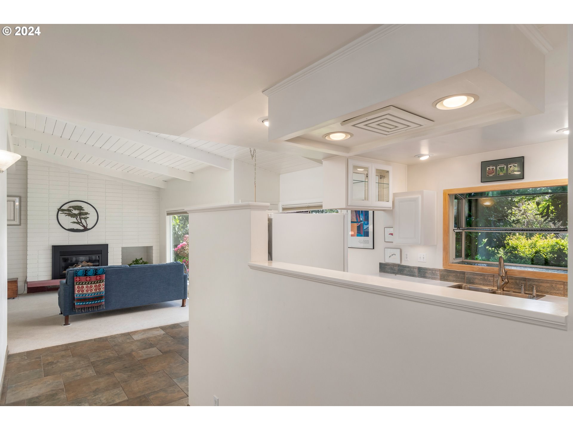 3430 View Lane Eugene, OR 97405 - Photo 4 of 48 a living room with a couch and a large window