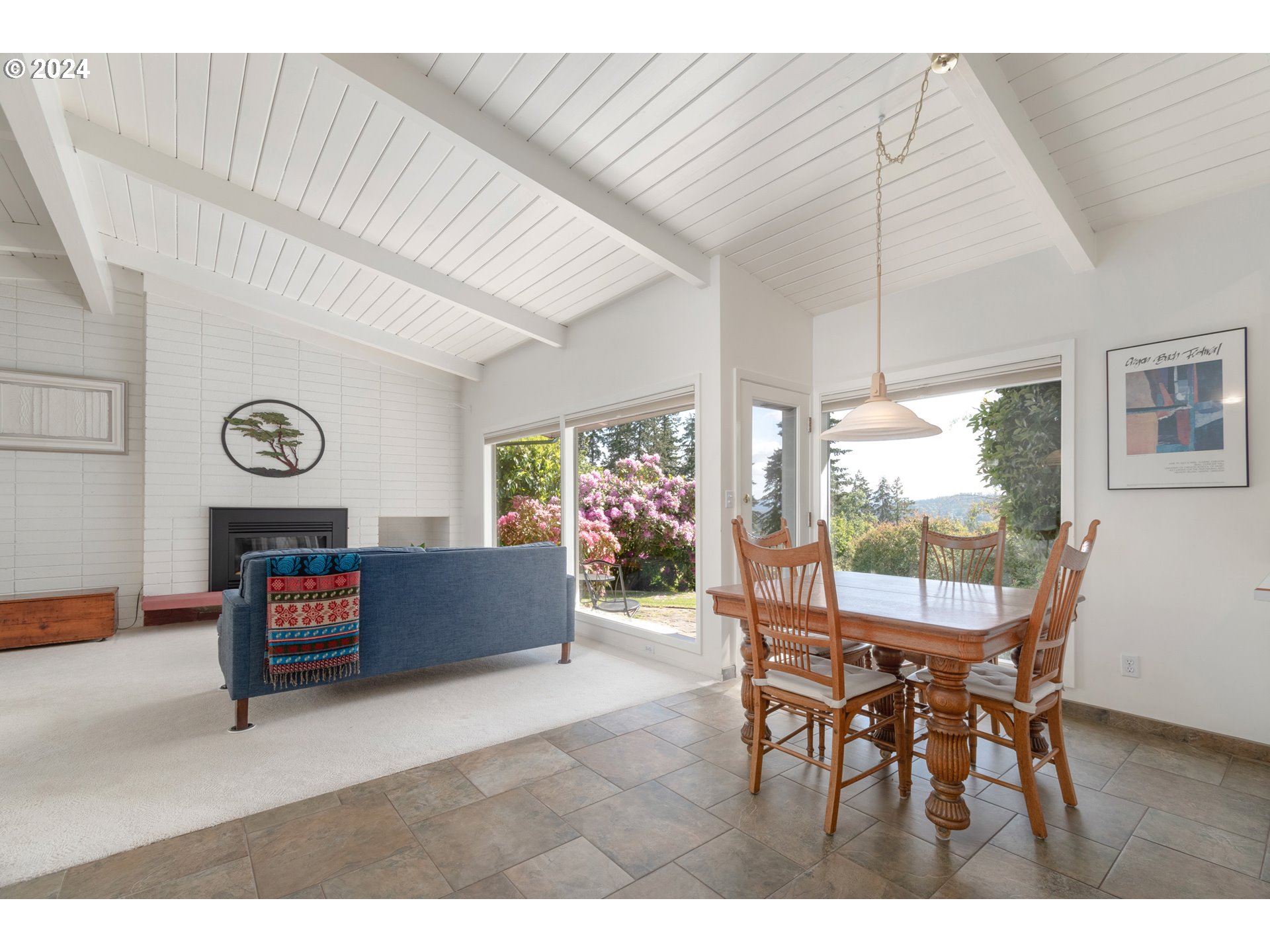 3430 View Lane Eugene, OR 97405 - Photo 5 of 48 a view of a dining room with furniture window and outside view