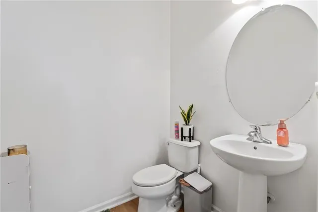 an aerial view of a house with outdoor space and street view