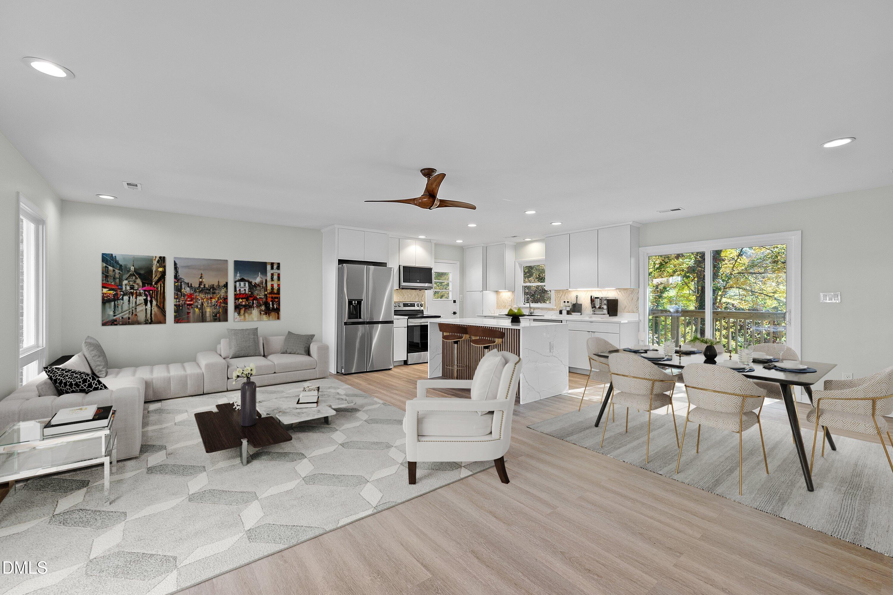 1124 Hardimont Road Raleigh, NC 27609 - Photo 3 of 34 a living room with furniture and a large window