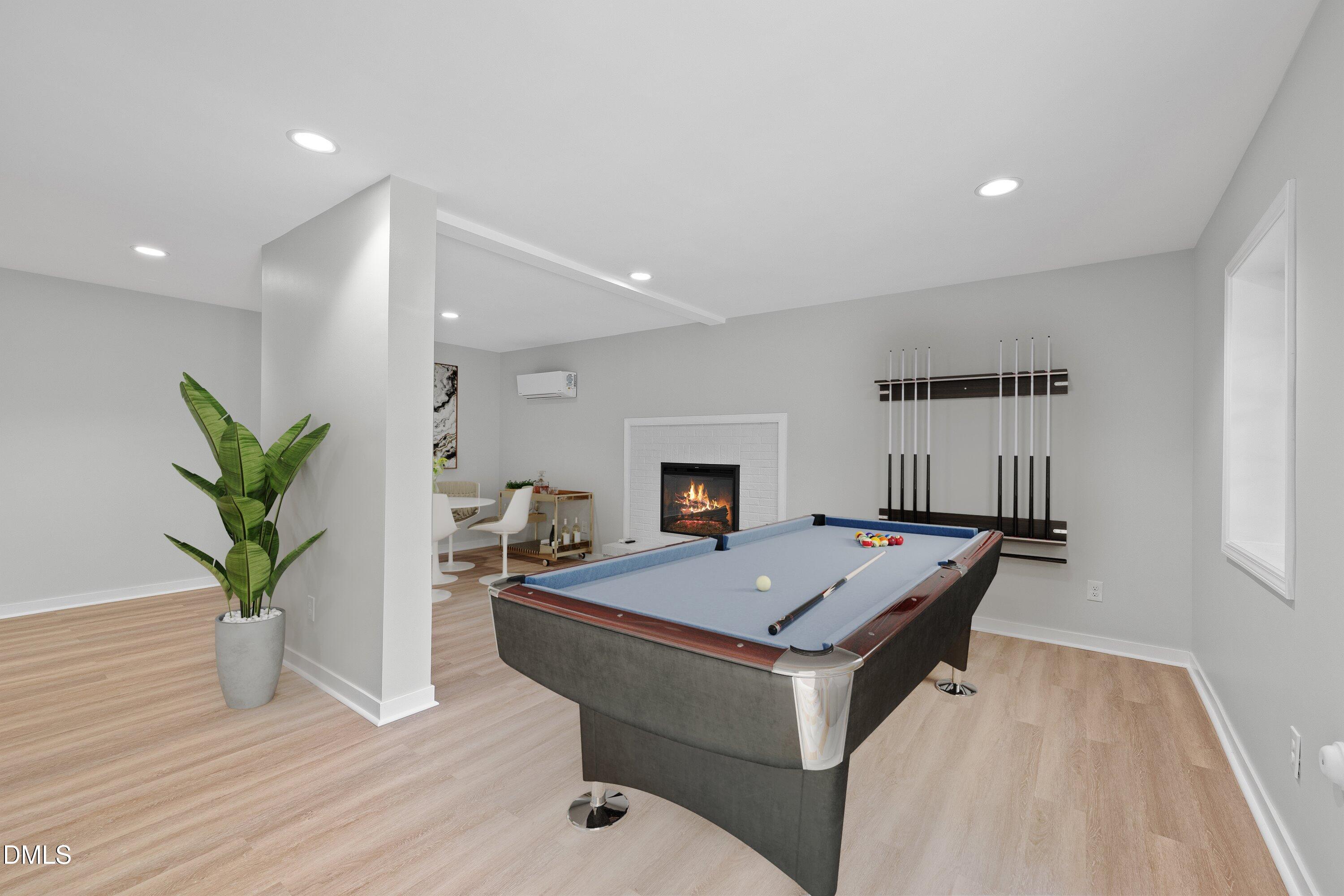 1124 Hardimont Road Raleigh, NC 27609 - Photo 4 of 34 a room with furniture and a wooden floor