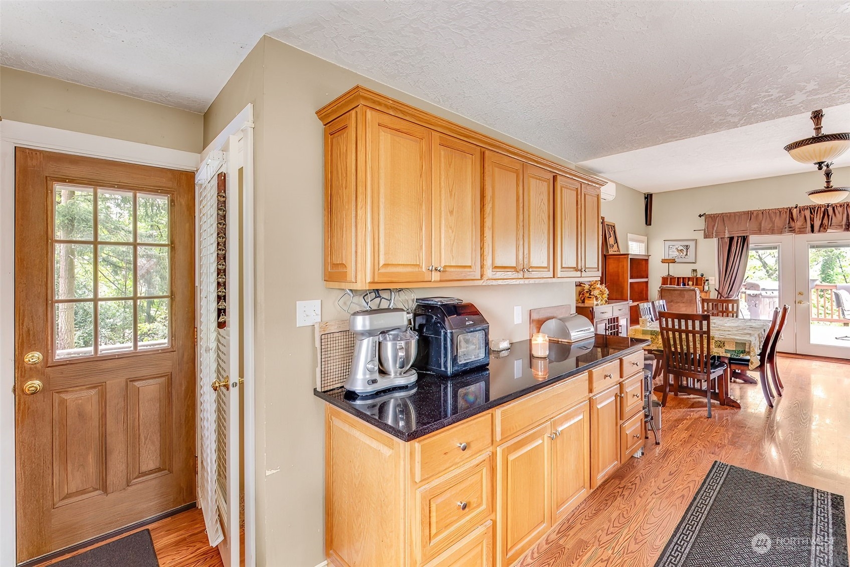 2320 West Castleman Street Longview, WA 98632 - Photo 13 of 36 a kitchen with stainless steel appliances granite countertop sink stove and large window