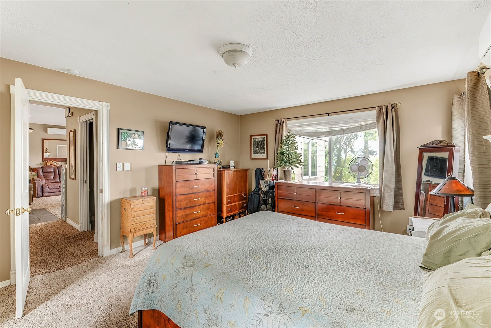 2320 West Castleman Street Longview, WA 98632 - Photo 16 of 36 a bedroom with furniture and large window