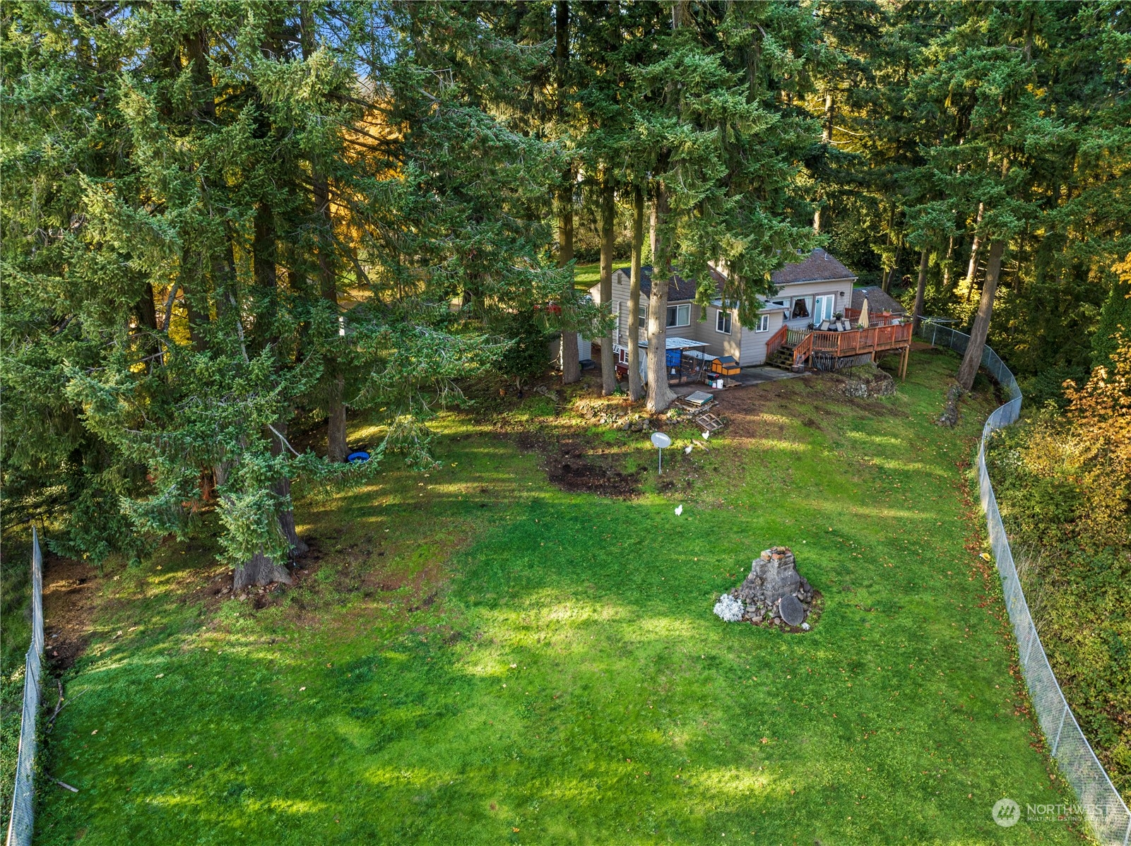 2320 West Castleman Street Longview, WA 98632 - Photo 23 of 36 a garden with trees in front of it
