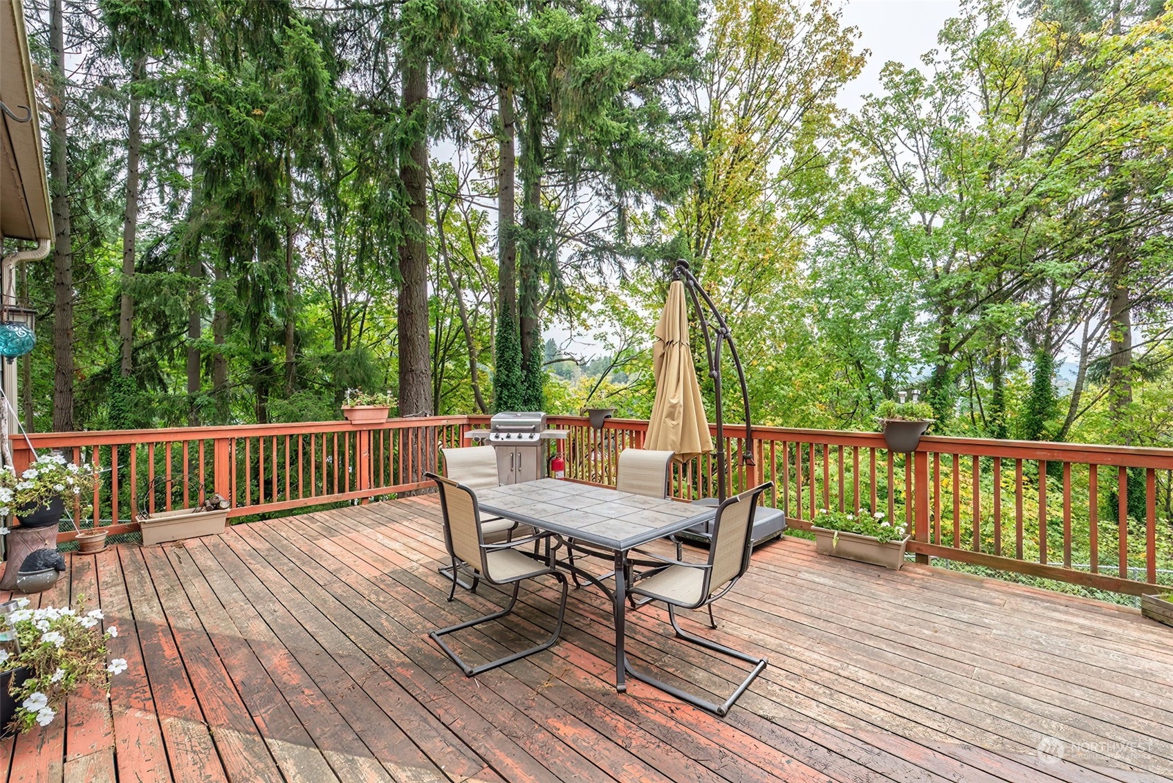 2320 West Castleman Street Longview, WA 98632 - Photo 26 of 36 a view of a deck with furniture and wooden floor