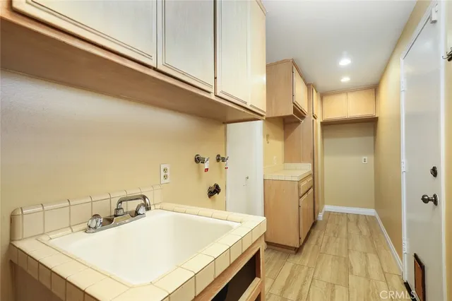 a bathroom with a tub and a sink