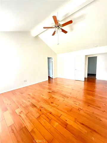 a bathroom with a double vanity sink a mirror and a bathtub