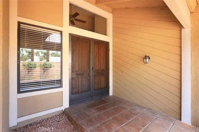 a view of a door and a window