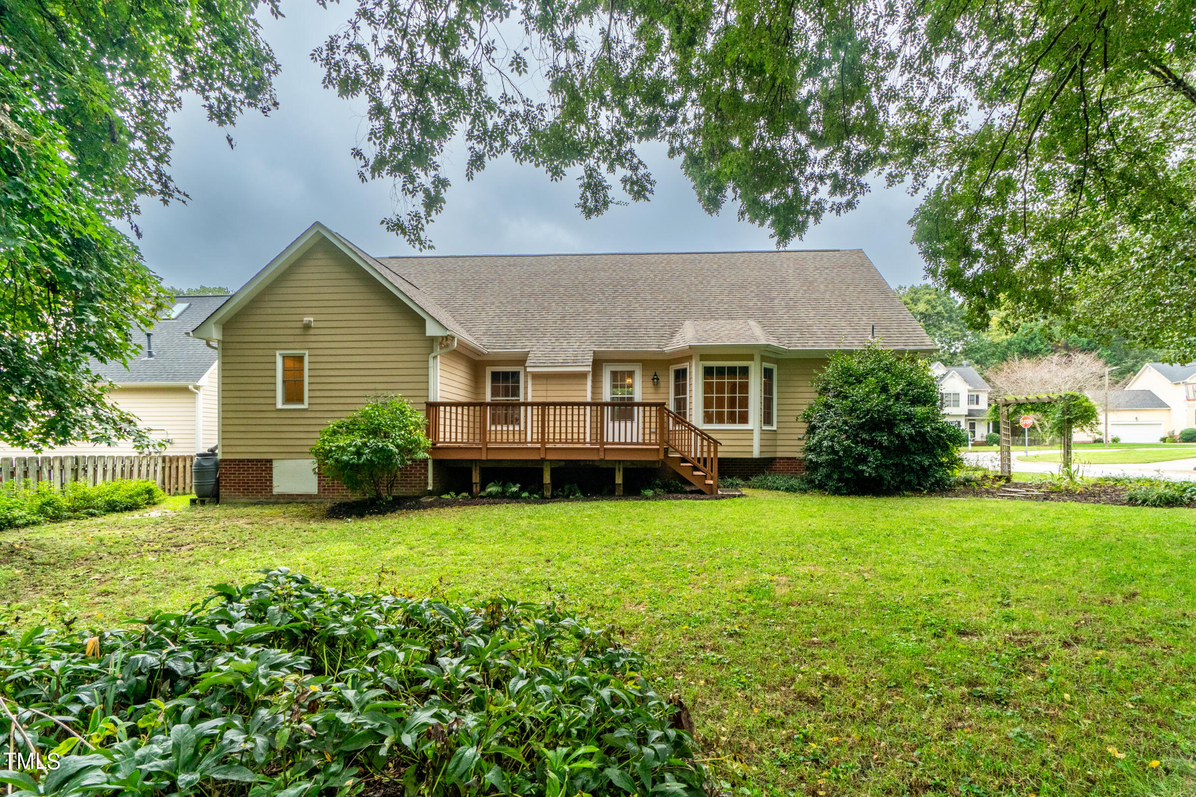 2 Summer Ridge Durham, NC 27712 - Photo 26 of 29 a front view of a house with a garden