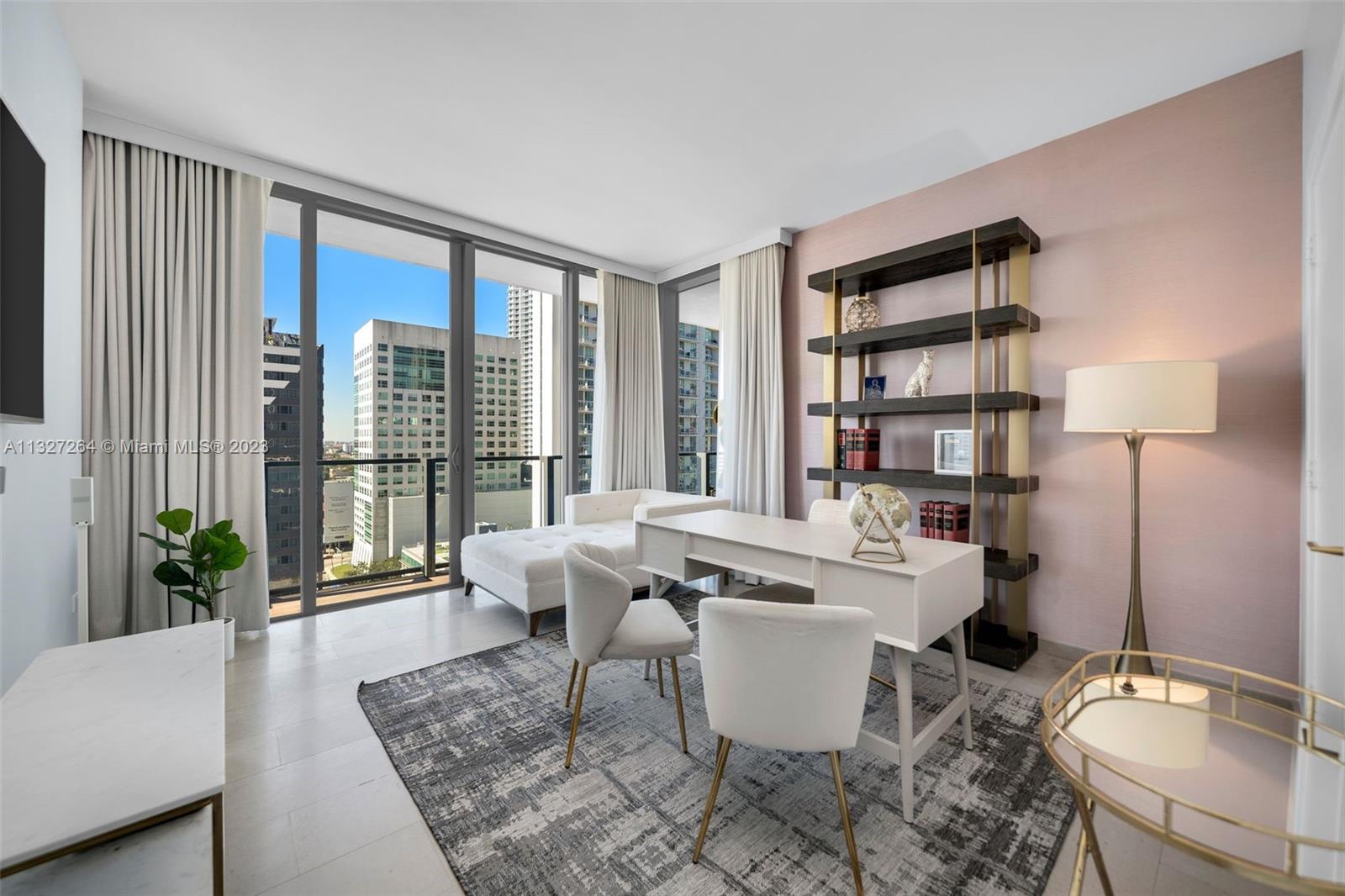 88 Southwest 7th Street, Unit 1212 Miami, FL 33130 - Photo 17 of 45 a living room with furniture a lamp a rug and a large window