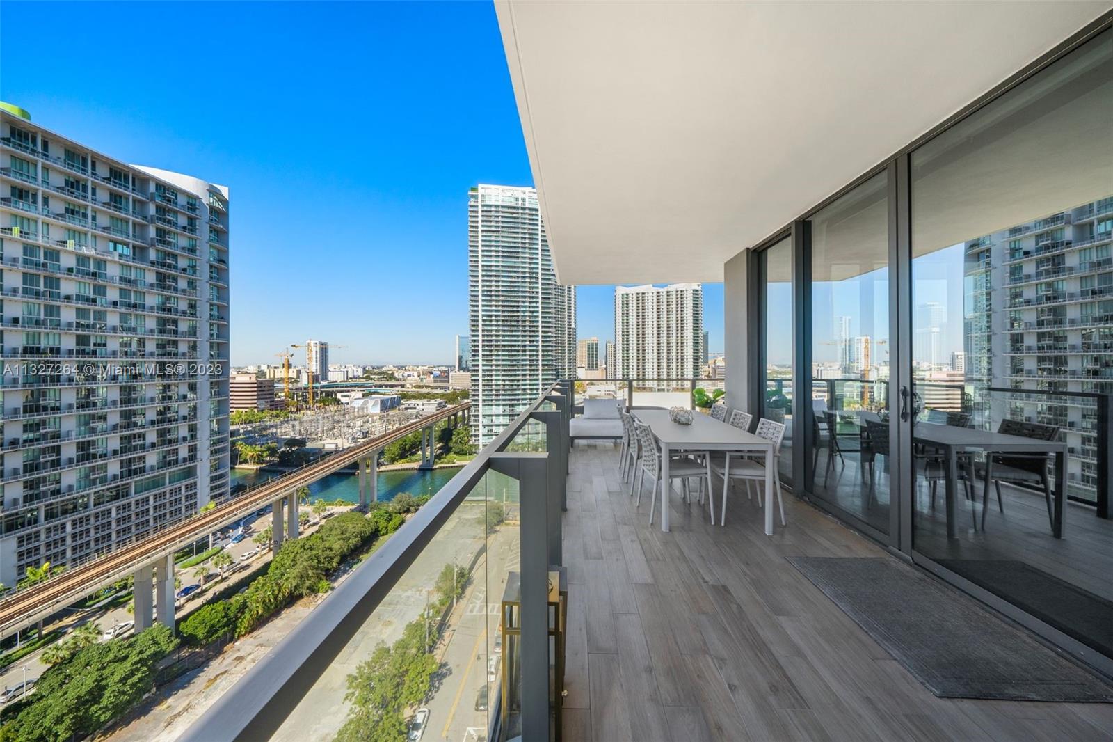 88 Southwest 7th Street, Unit 1212 Miami, FL 33130 - Photo 31 of 45 a view of balcony with chairs