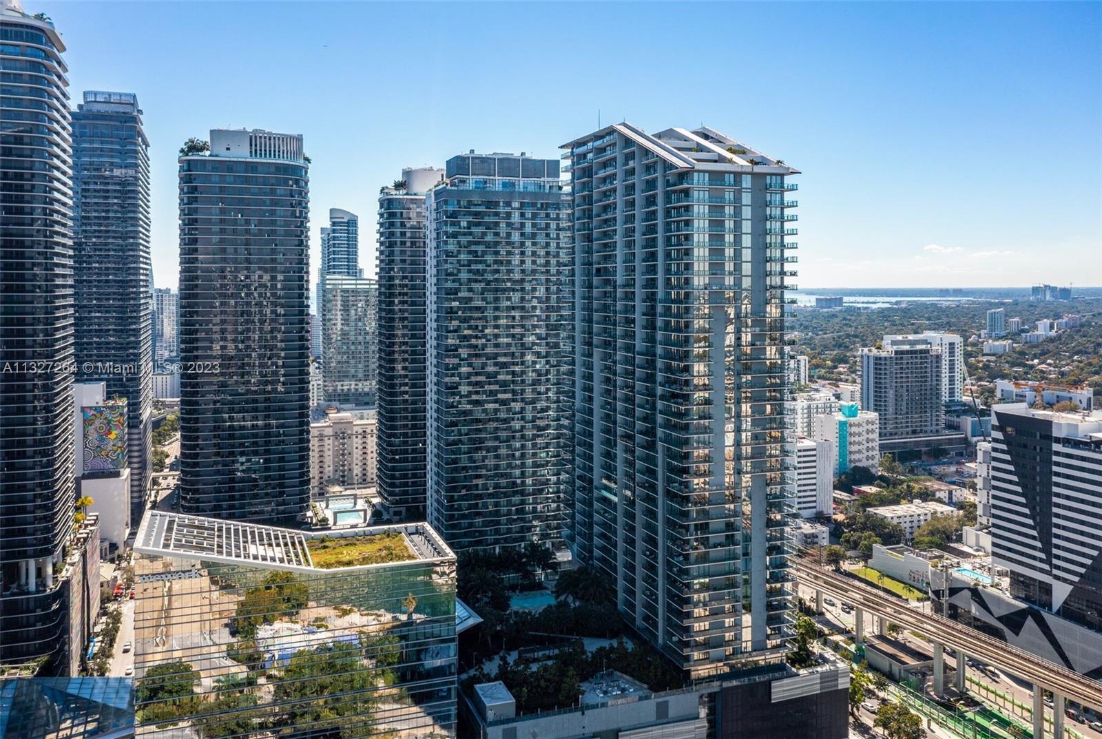 88 Southwest 7th Street, Unit 1212 Miami, FL 33130 - Photo 44 of 45 a view of a city with tall buildings