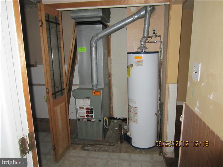 18 Randolph Road Woodbury, NJ 08096 - Photo 20 of 22 a view of storage and utility room with stairs