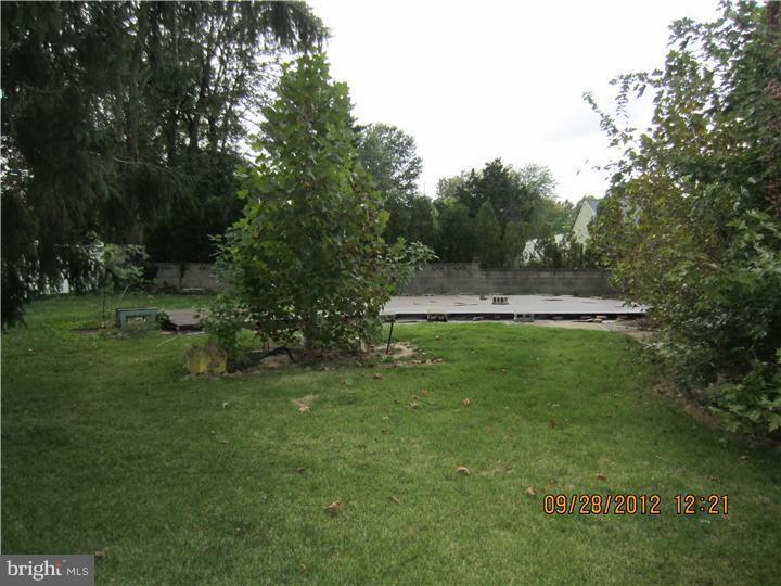 18 Randolph Road Woodbury, NJ 08096 - Photo 22 of 22 a view of a park with large trees