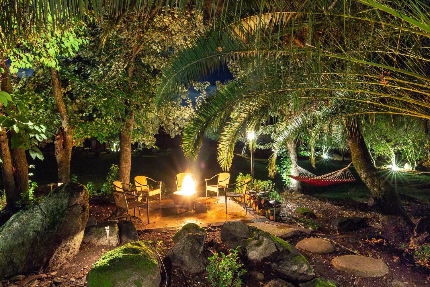 a view of a backyard of the house