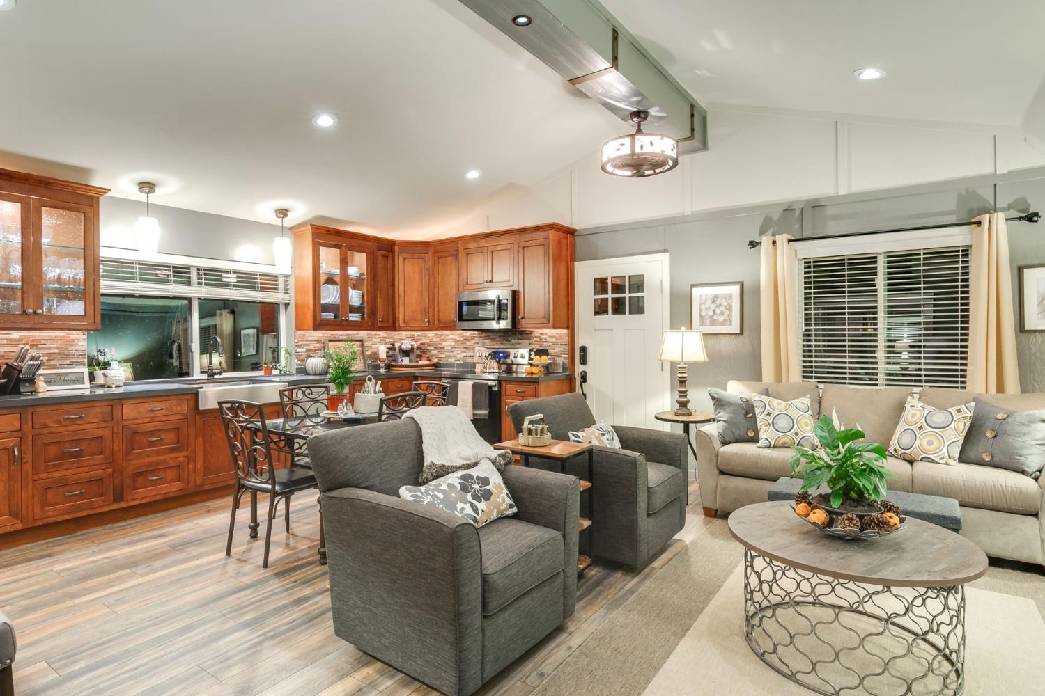 7333 Surette Lane Loomis, CA 95650 - Photo 23 of 42 a living room with furniture kitchen and a large window