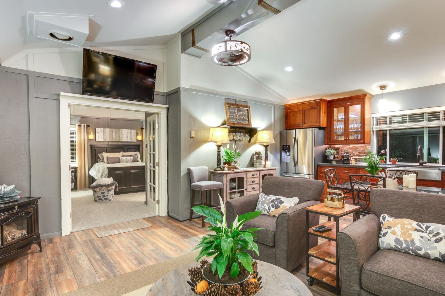 7333 Surette Lane Loomis, CA 95650 - Photo 24 of 42 a living room with furniture and a flat screen tv