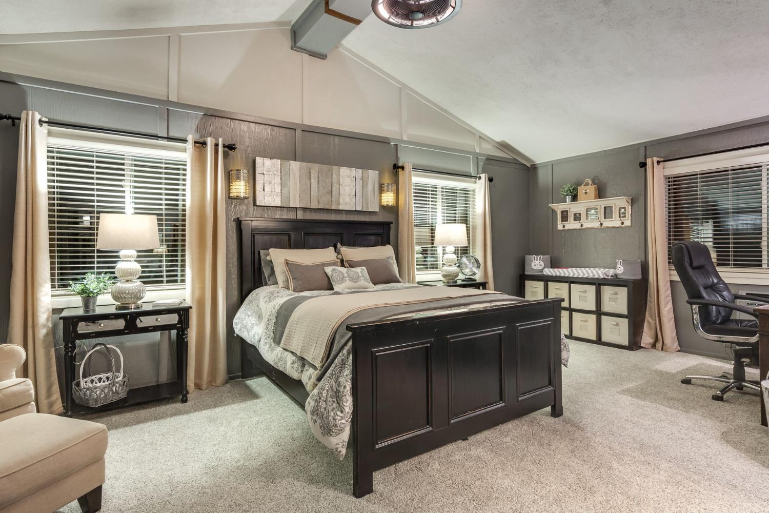 7333 Surette Lane Loomis, CA 95650 - Photo 26 of 42 a bedroom with a bed and a dresser next to a window