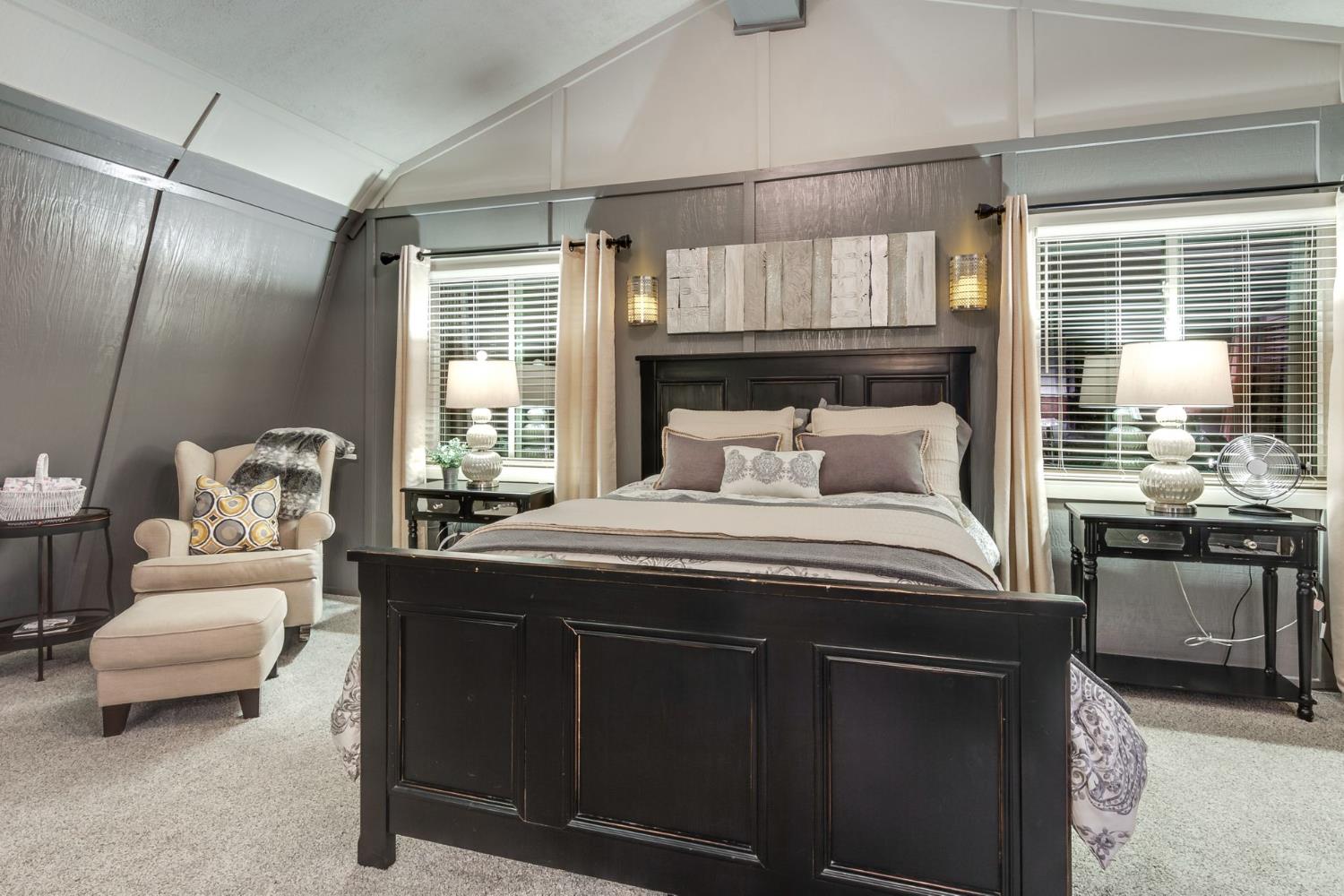 7333 Surette Lane Loomis, CA 95650 - Photo 27 of 42 a bedroom with a bed and a couch