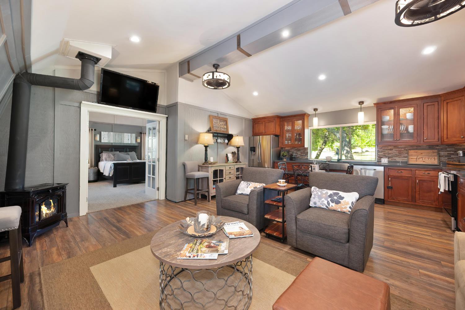 7333 Surette Lane Loomis, CA 95650 - Photo 29 of 42 a living room with furniture kitchen view and a large window