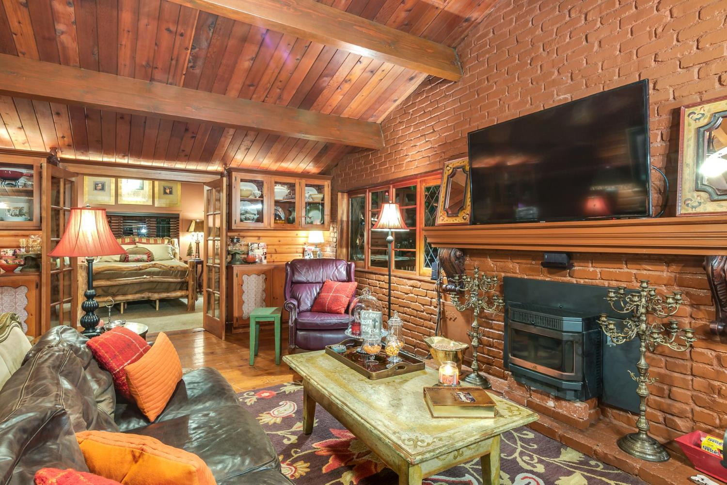 7333 Surette Lane Loomis, CA 95650 - Photo 6 of 42 a outdoor living space with patio furniture and a fireplace