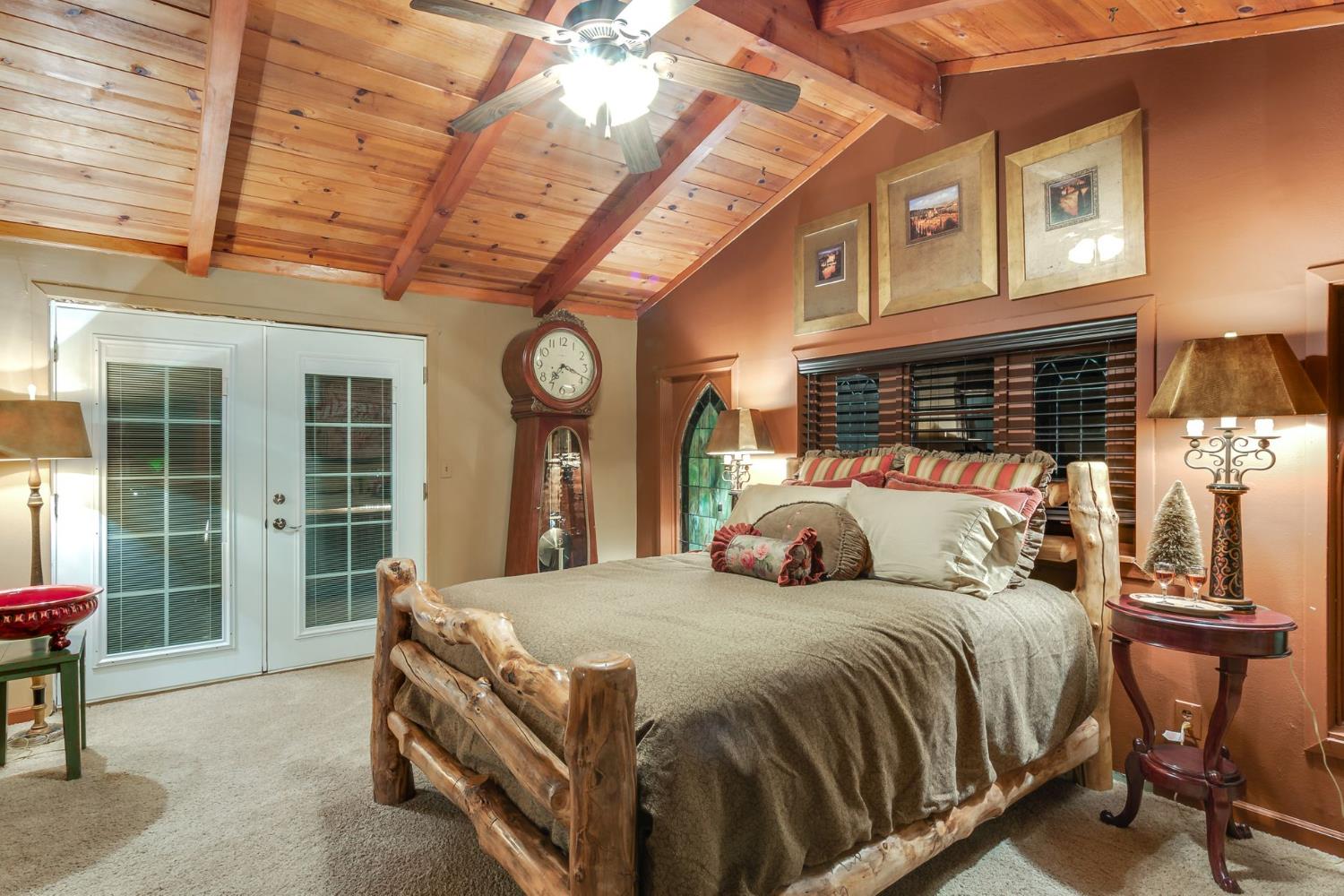 7333 Surette Lane Loomis, CA 95650 - Photo 9 of 42 a bed sitting in a bedroom next to a window