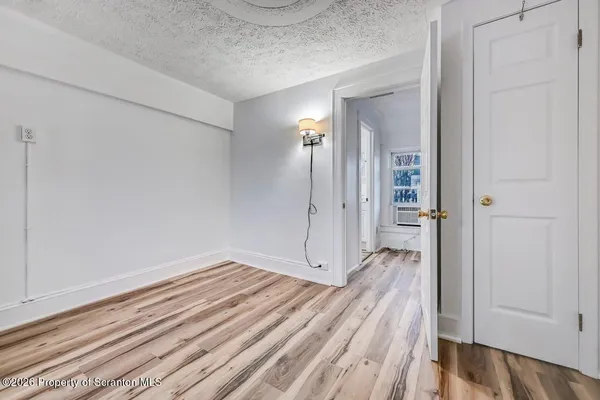 a bathroom with a sink and shower