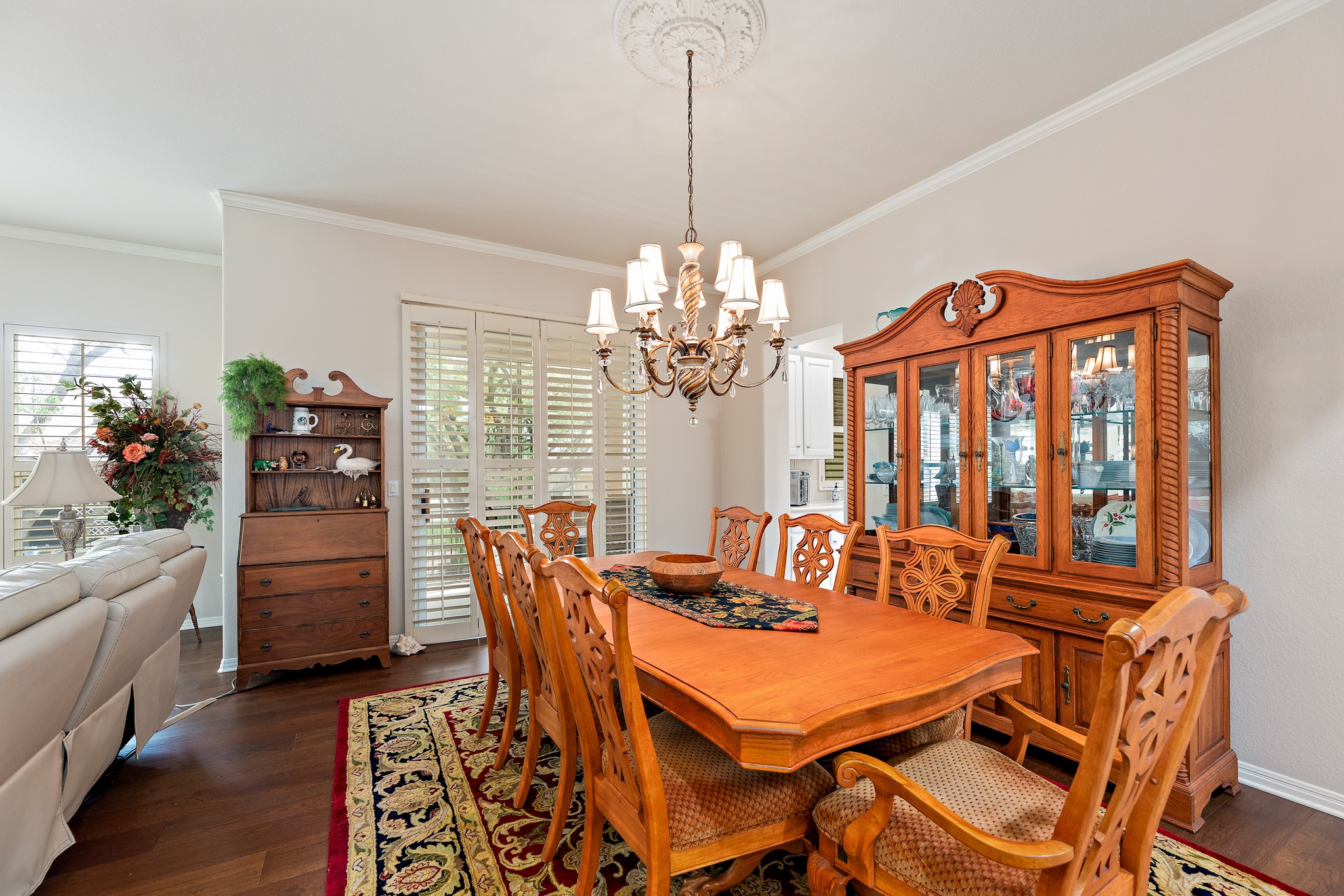 106 Wild Turkey Lane Georgetown, TX 78633 - Photo 9 of 39 a dining room with furniture a chandelier and wooden floor
