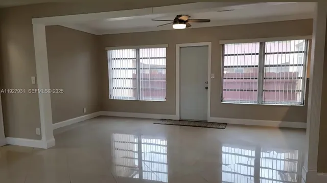 an empty room with windows
