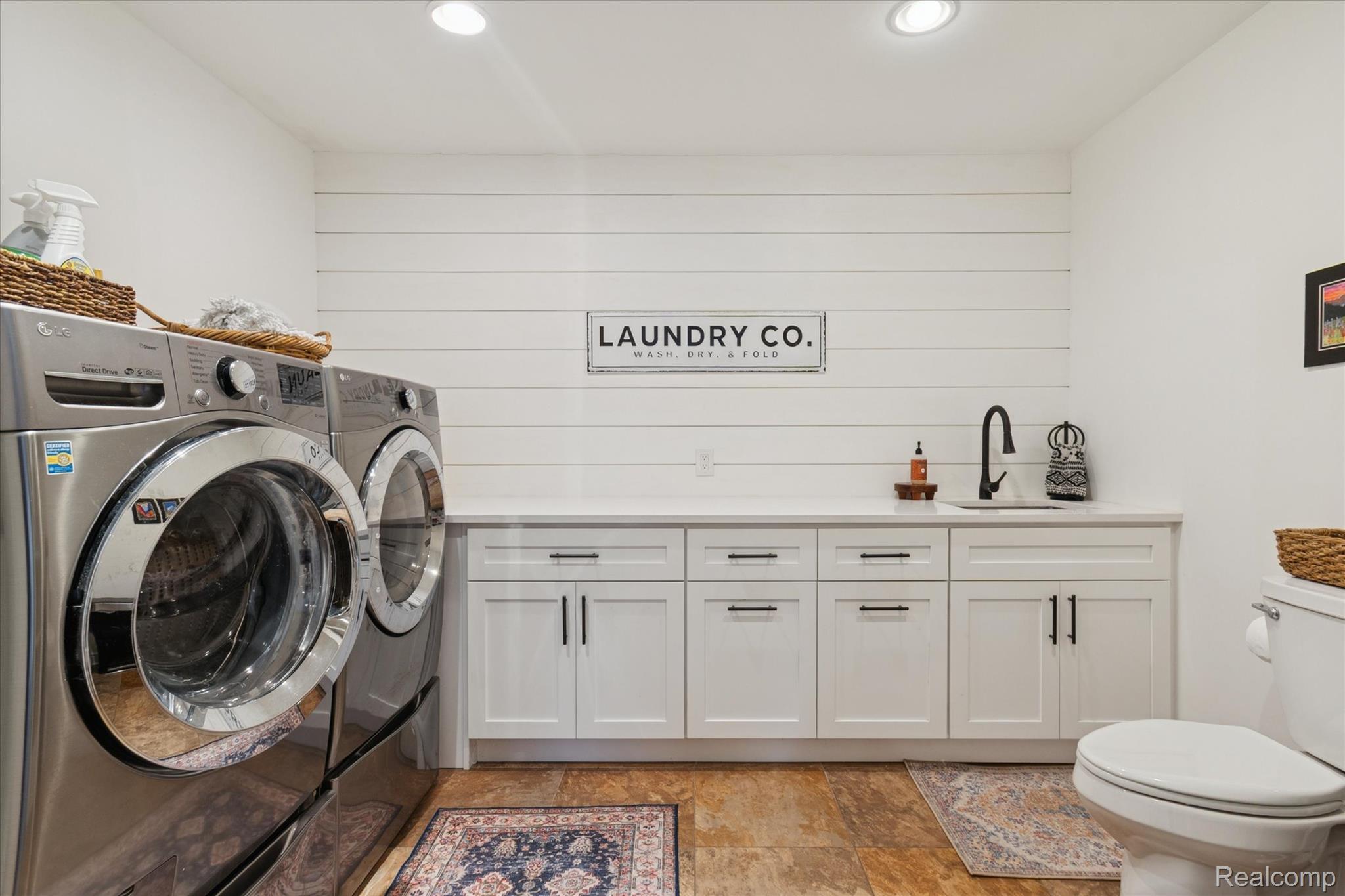 187 Darwin Road Pinckney, MI 48169 - Photo 27 of 71 Half bath/Laundry area with washer and dryer and recessed lighting