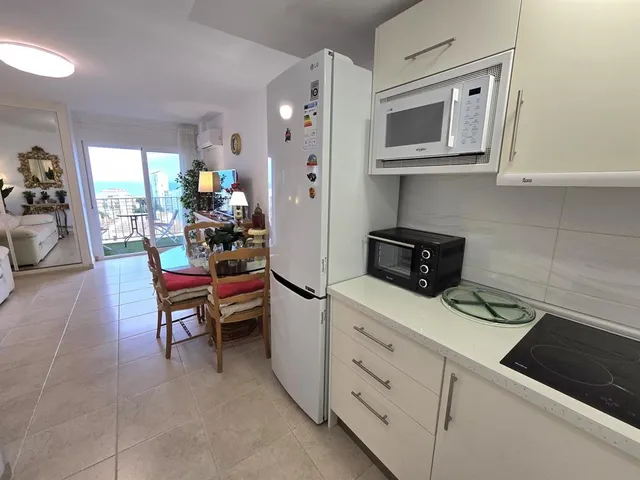 a view of a bathroom from a hallway