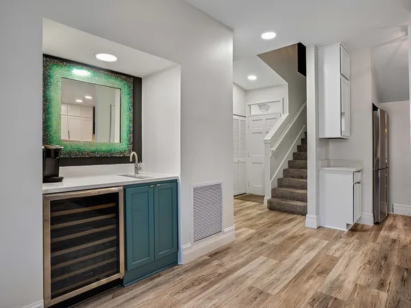 a bathroom with a sink and a mirror