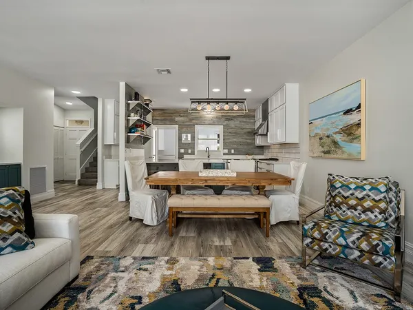 a view of a living room and dining room