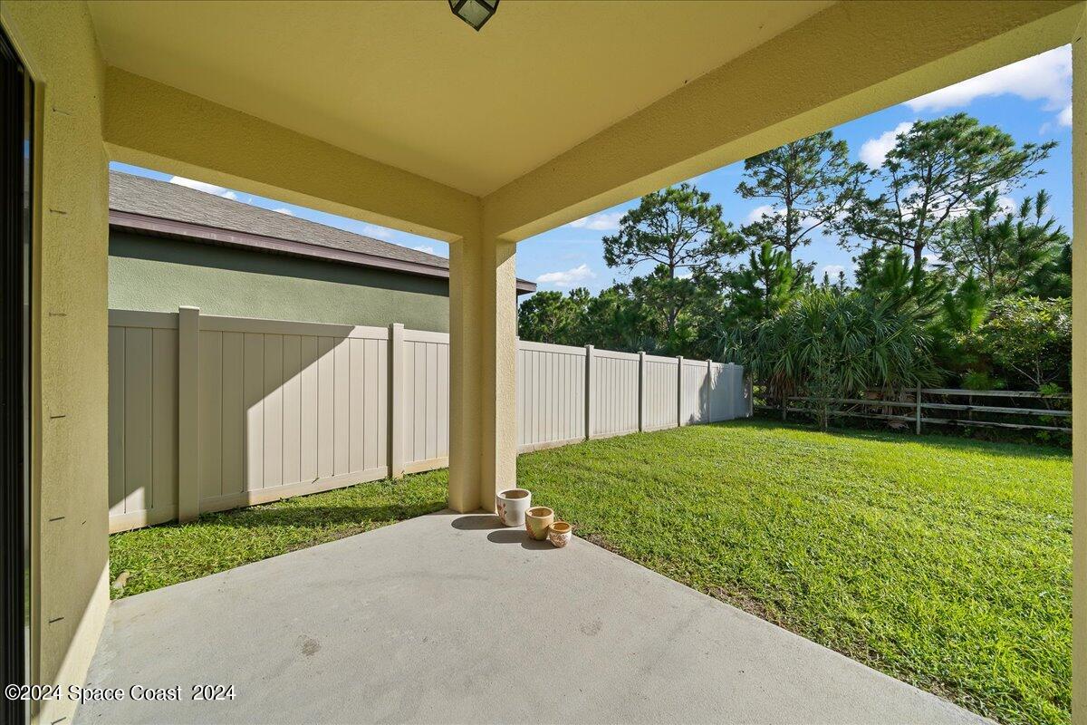 694 Old Country Rd S East Palm Bay, FL 32909 - Photo 27 of 42 Porch