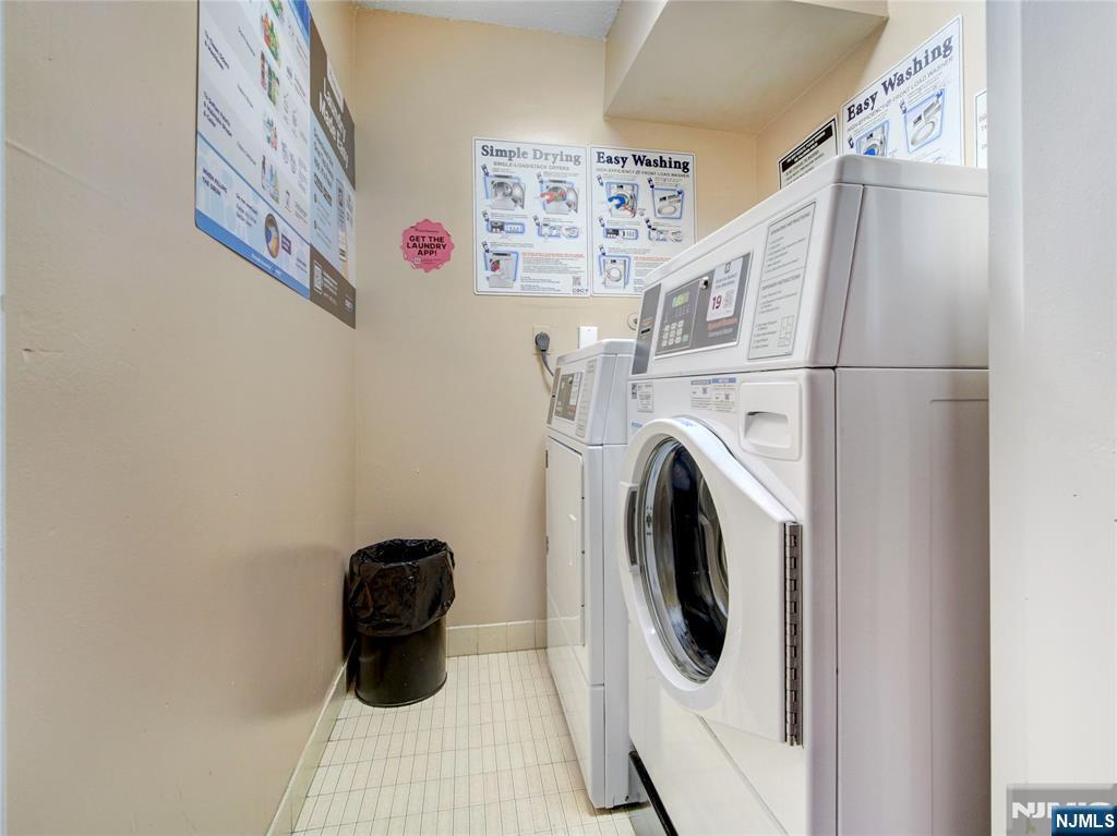 160 Overlook Avenue, Unit 17C Hackensack, NJ 07601 - Photo 26 of 30 a utility room with dryer and washer
