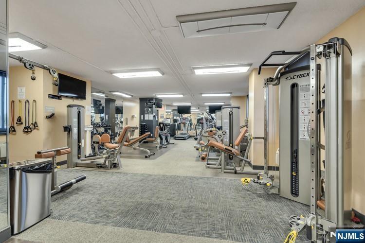 160 Overlook Avenue, Unit 17C Hackensack, NJ 07601 - Photo 27 of 30 a view of a room with gym equipment