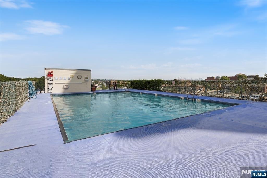 160 Overlook Avenue, Unit 17C Hackensack, NJ 07601 - Photo 30 of 30 a view of a lake with city