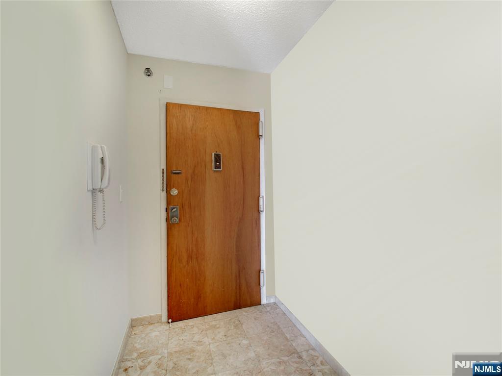 160 Overlook Avenue, Unit 17C Hackensack, NJ 07601 - Photo 5 of 30 a view of hallway with closet