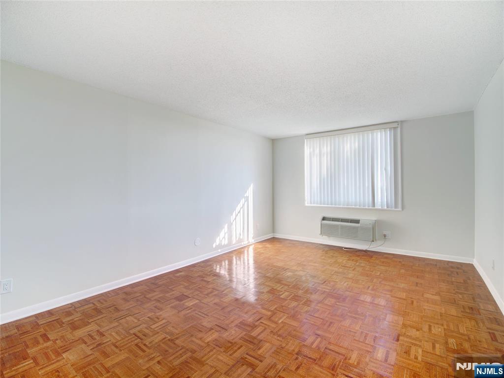 160 Overlook Avenue, Unit 17C Hackensack, NJ 07601 - Photo 8 of 30 a view of an empty room with a window