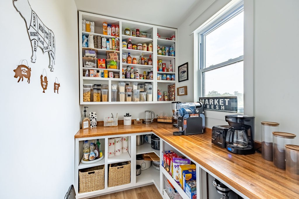3765 S Road Cadiz, KY 42211 - Photo 20 of 78 a view of a workspace with furniture and a window