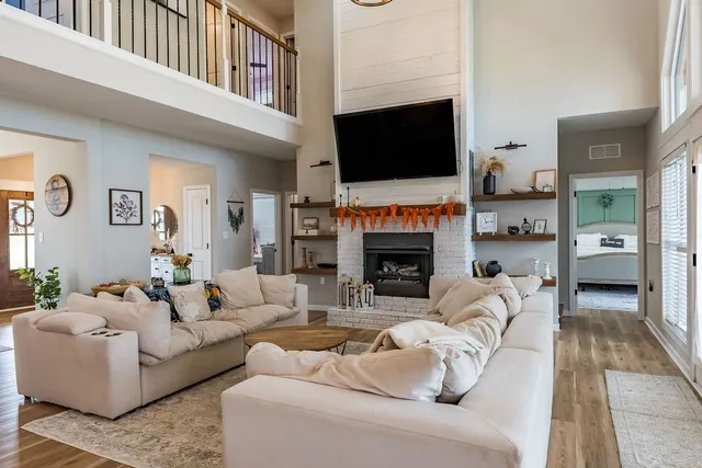 a bedroom with furniture and windows