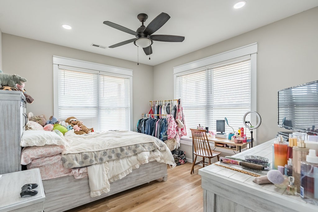 3765 S Road Cadiz, KY 42211 - Photo 28 of 78 a bedroom with a bed and a chandelier