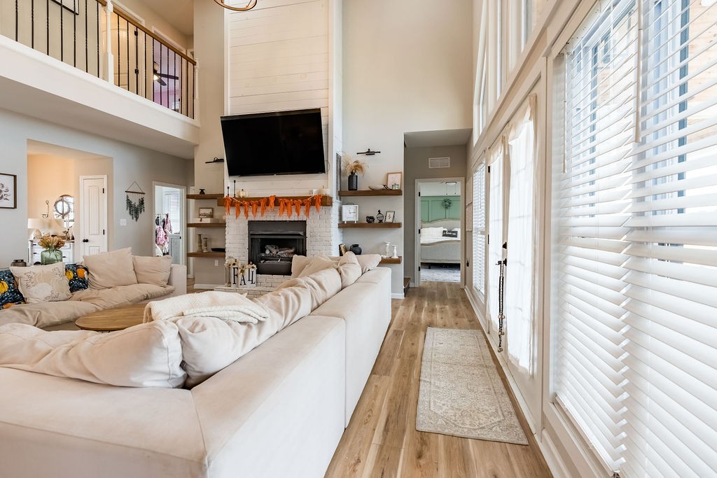 3765 S Road Cadiz, KY 42211 - Photo 31 of 78 a living room with fireplace furniture and a flat screen tv