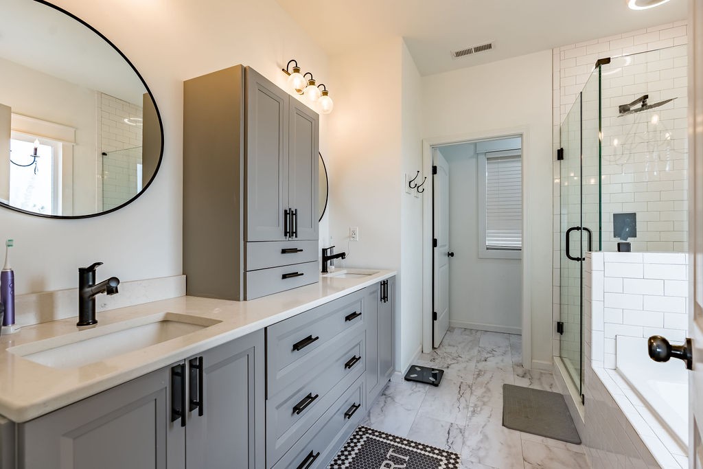3765 S Road Cadiz, KY 42211 - Photo 35 of 78 a bathroom with a double vanity sink mirror and shower