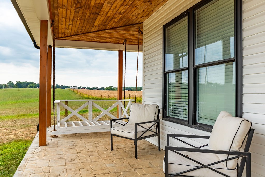 3765 S Road Cadiz, KY 42211 - Photo 62 of 78 a view of a room with chairs and table in balcony