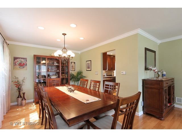 910 Dannet Road Buffalo Grove, IL 60089 - Photo 8 of 25 a view of a dining room with furniture