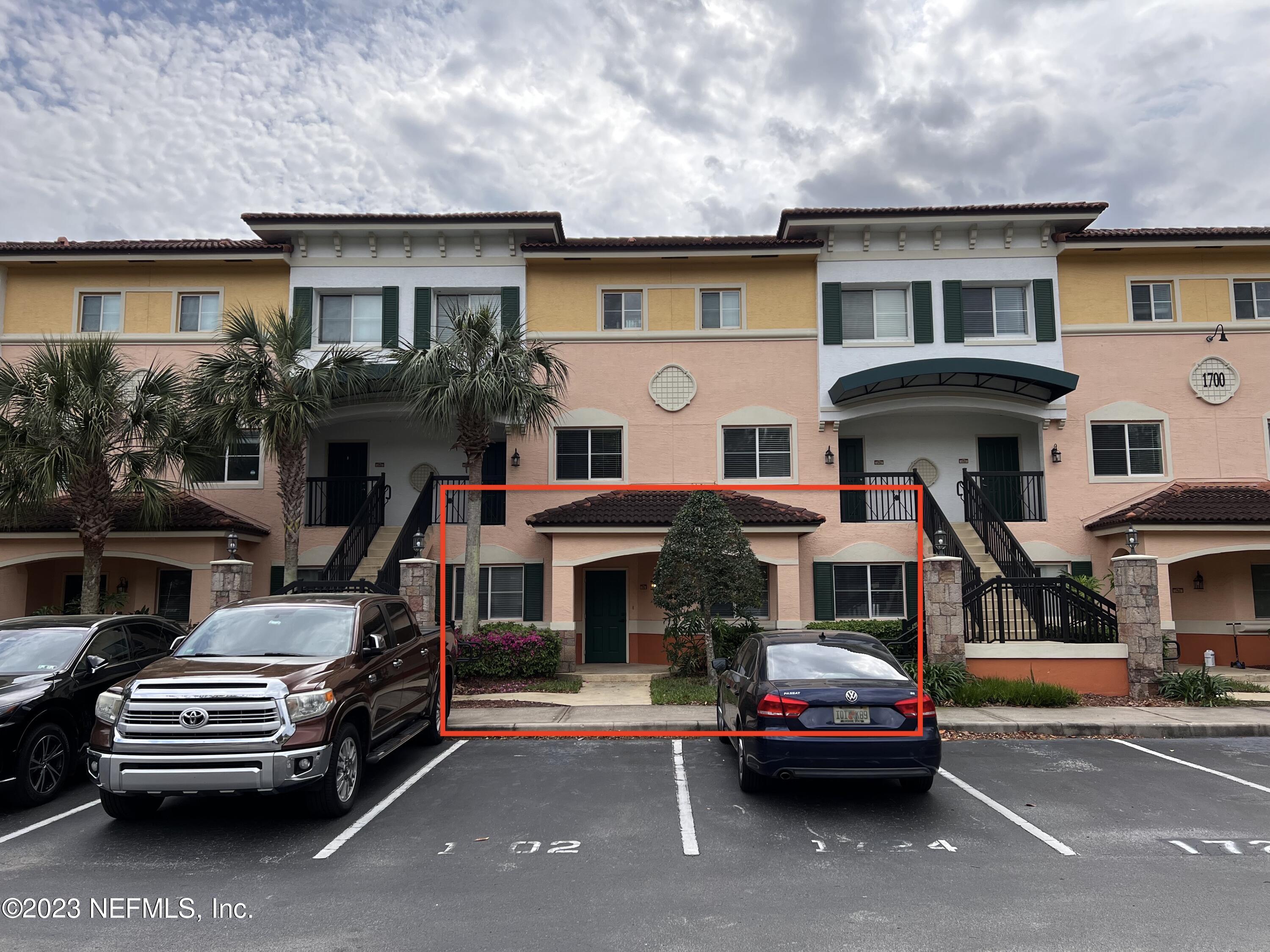 9745 Touchton Road, Unit 1702 Jacksonville, FL 32246 - Photo 3 of 62 a car parked in front of a white house